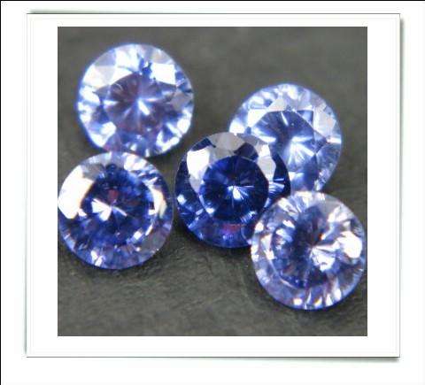 CLEARANCE SALE - Created Tanzanite Round Facets - 0.45cts avg. each - 28 pcs on offer!