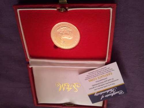 Spotless boxed brand new solid pure gold