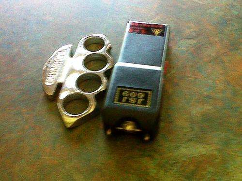 Stun Gun With Light and Pouch ( Free Knuckle Guard )