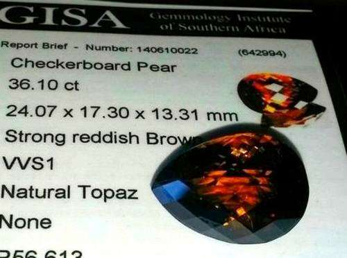 G.I.S.A. CERTIFIED 36.10CT TOPAZ  Strong Reddish Brown, VVS