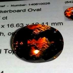 G.I.S.A. CERTIFIED 32.17CT TOPAZ  Strong Reddish Orange, VVS