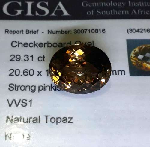 G.I.S.A. CERTIFIED 29.31CT TOPAZ  Strong Pinkish Brown, VVS