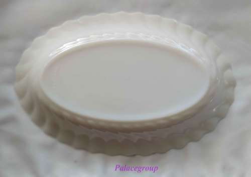 Set of 2 white condiment bowls, Arcopal - France, Lilly theme, oval shape.