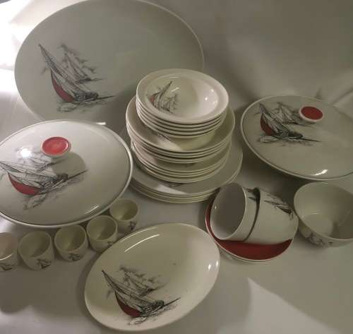 Dinner service with sailboat motif