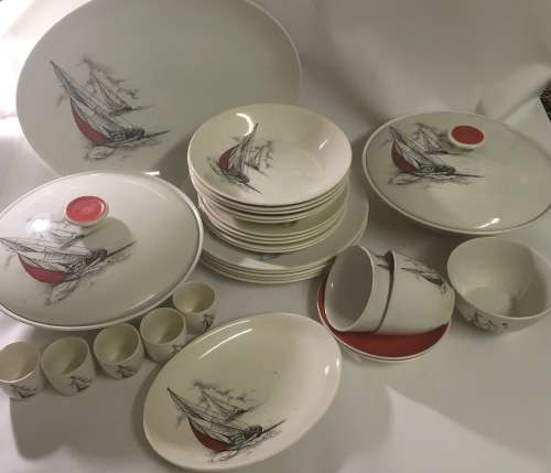 Dinner service with sailboat motif