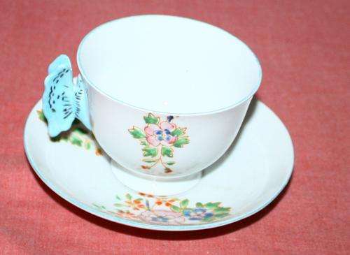 Cup and Saucer with butterfly handle