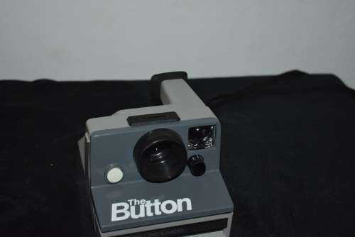 The Button Polaroid Land Camera