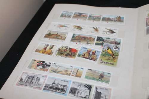 300 Stamps in A5 book on SWA