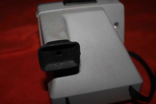 The Button Polaroid Camera