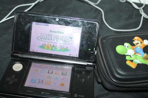Nintendo DS3 with Charger,  Case and one game,