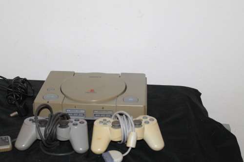 Sony Playstation One with two controllers