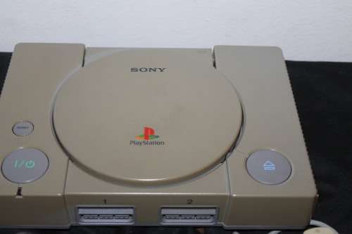 Sony Playstation One with two controllers