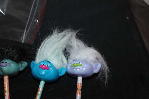 4 Trolls with pencil