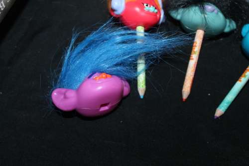 4 Trolls with pencil