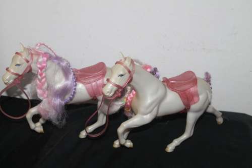 2 Pink and White Horses