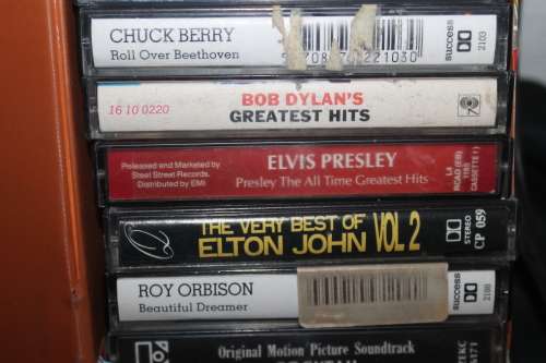 12 Assorted Cassettes in holder