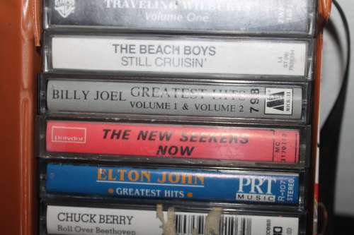 12 Assorted Cassettes in holder