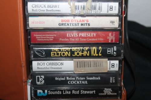 12 Assorted Cassettes in holder