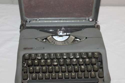 Typewriter in metal case