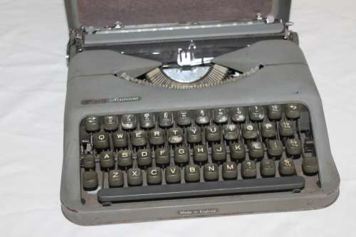 Typewriter in metal case
