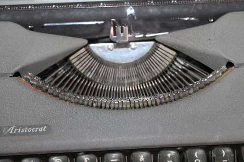 Typewriter in metal case