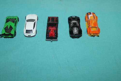 5 Assorted Hot wheels Cars