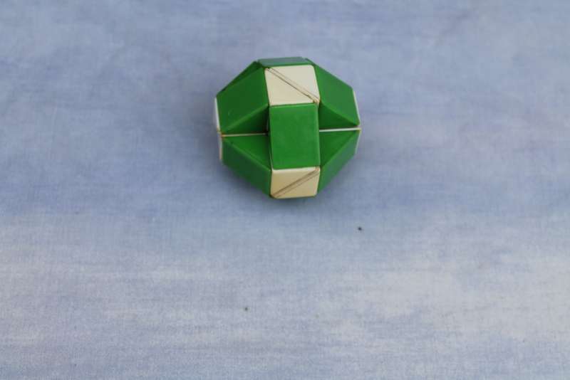 3 Wooden Spinning Tops & a Rubik `snake`