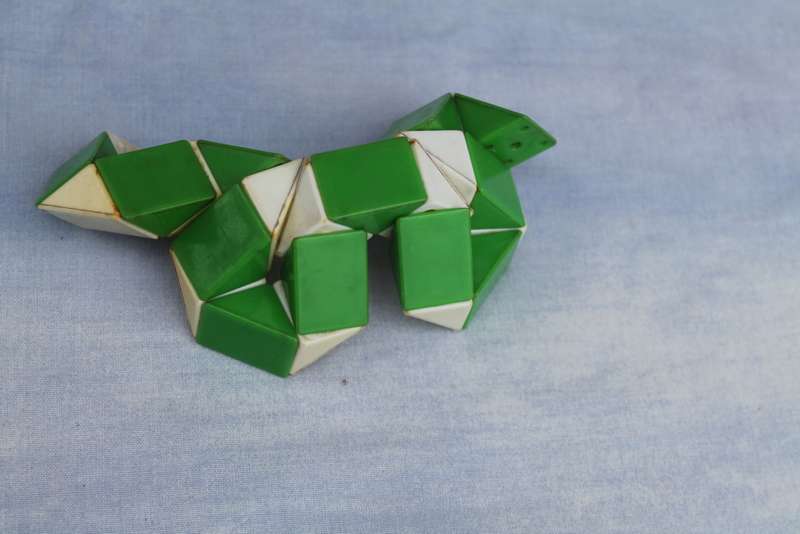 3 Wooden Spinning Tops & a Rubik `snake`