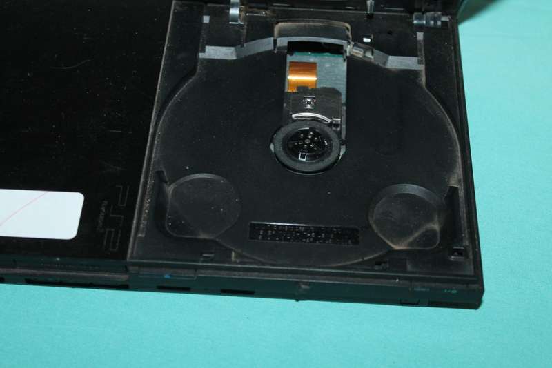 Playstation 2 Slim with 4 games and controller