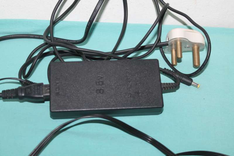 Playstation 2 Slim with 4 games and controller