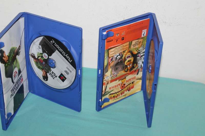 Playstation 2 Slim with 4 games and controller