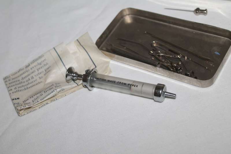 Glass Syringe in metal box