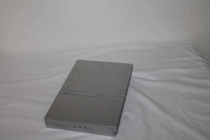 PlayStation 2  with 2 Controller`s, Memory Card, bag and manual