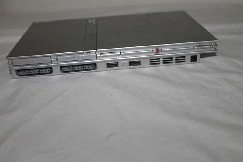 PlayStation 2  with 2 Controller`s, Memory Card, bag and manual