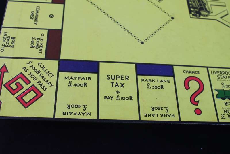 Monopoly has wooden pieces / 2 Boards No 4