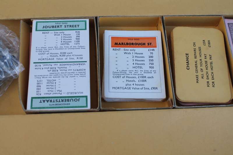 Monopoly has wooden pieces / 2 Boards No 4