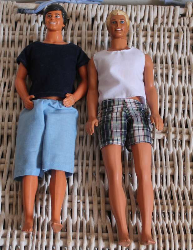 2 Ken dolls and 4 Barbies