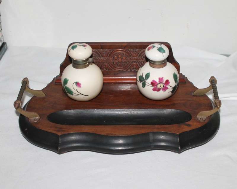 Vintage inkwells on stand