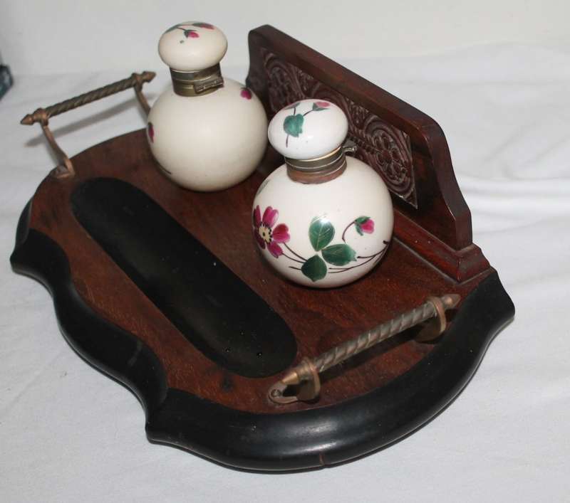 Vintage inkwells on stand