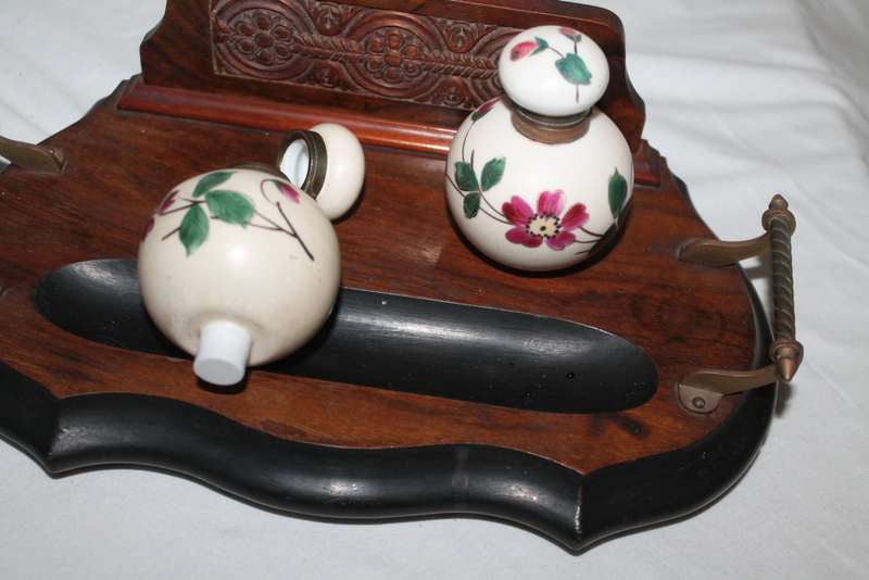 Vintage inkwells on stand