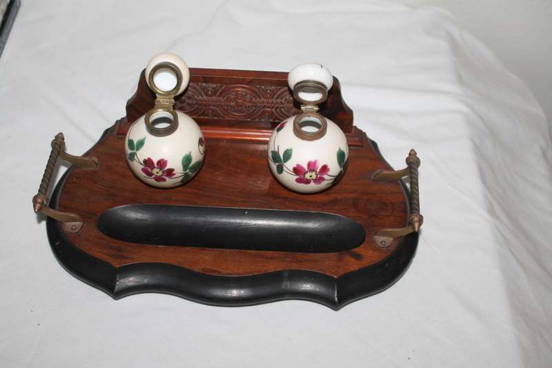 Vintage inkwells on stand