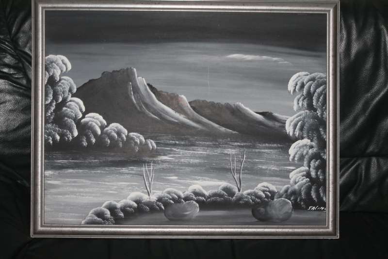 2 Black and White Framed Pictures