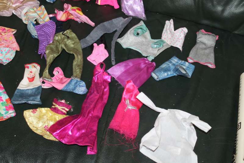 11 Barbies, ken and Barbie clothing