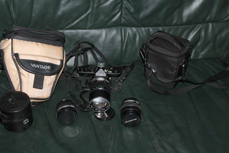Olympus OM 1 Film Camera with three lenses