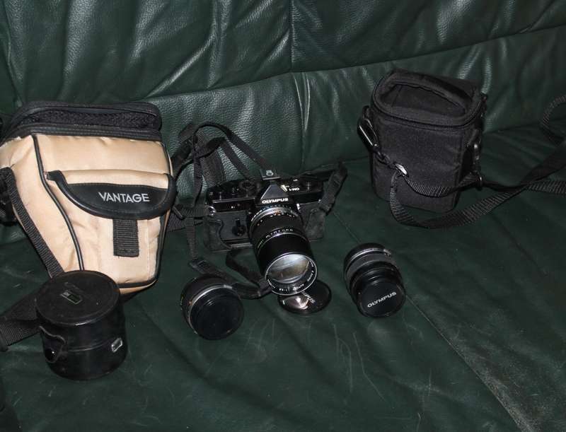 Olympus OM 1 Film Camera with three lenses
