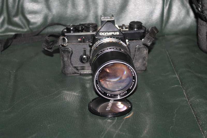 Olympus OM 1 Film Camera with three lenses