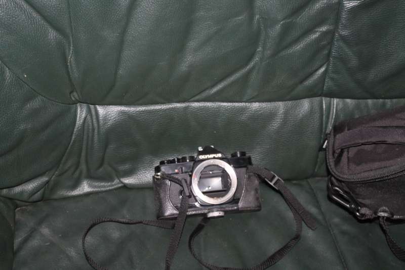 Olympus OM 1 Film Camera with three lenses
