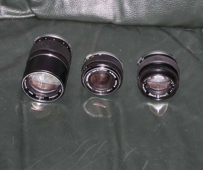 Olympus OM 1 Film Camera with three lenses