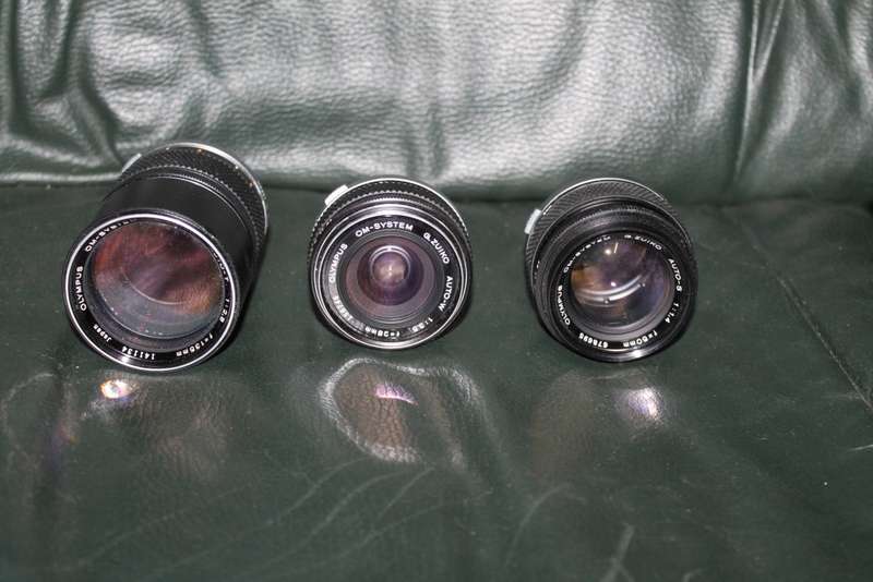 Olympus OM 1 Film Camera with three lenses