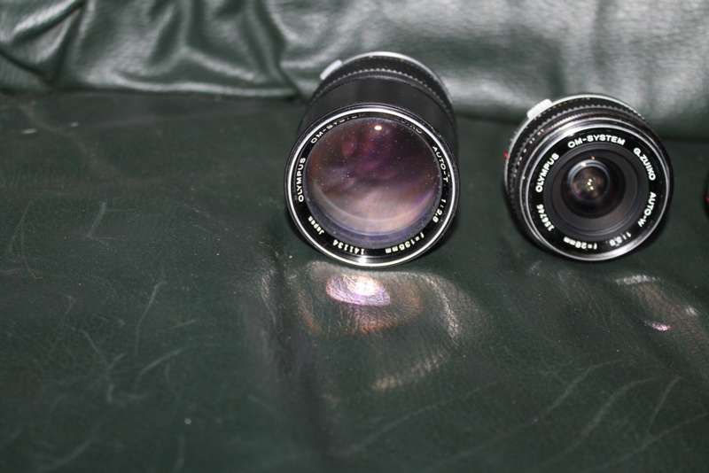 Olympus OM 1 Film Camera with three lenses